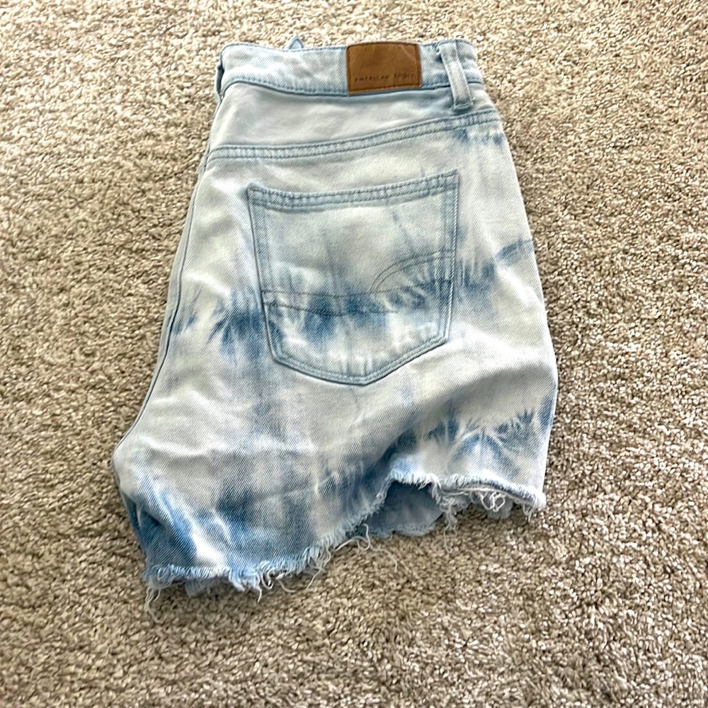 Light blue tie dye jean shorts